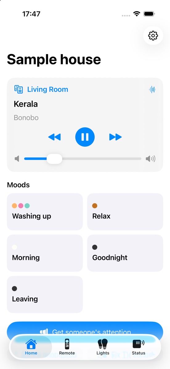 The House iPhone app showing a sample house: a track playing on the living-room speaker with play, pause and volume, and tiles for the moods Washing up, Relax, Morning, Goodnight and Leaving