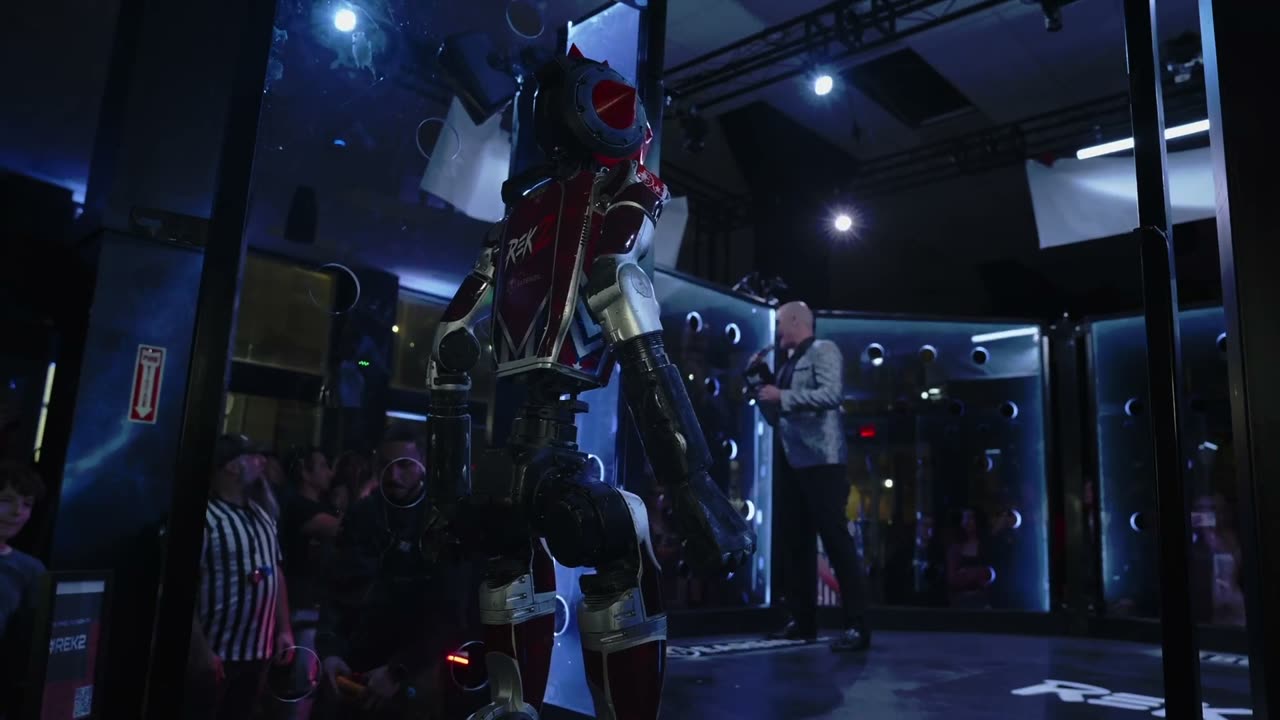 The T800 humanoid robot walking through the crowd at REK2