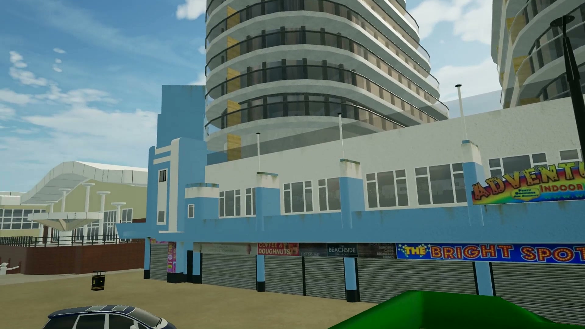 A colourful seafront arcade beneath tall apartment blocks in virtual New Brighton